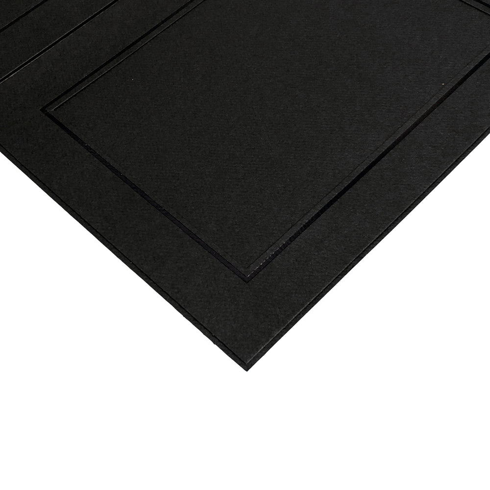 Corner of black Tri-Pod Folio frame with black trim